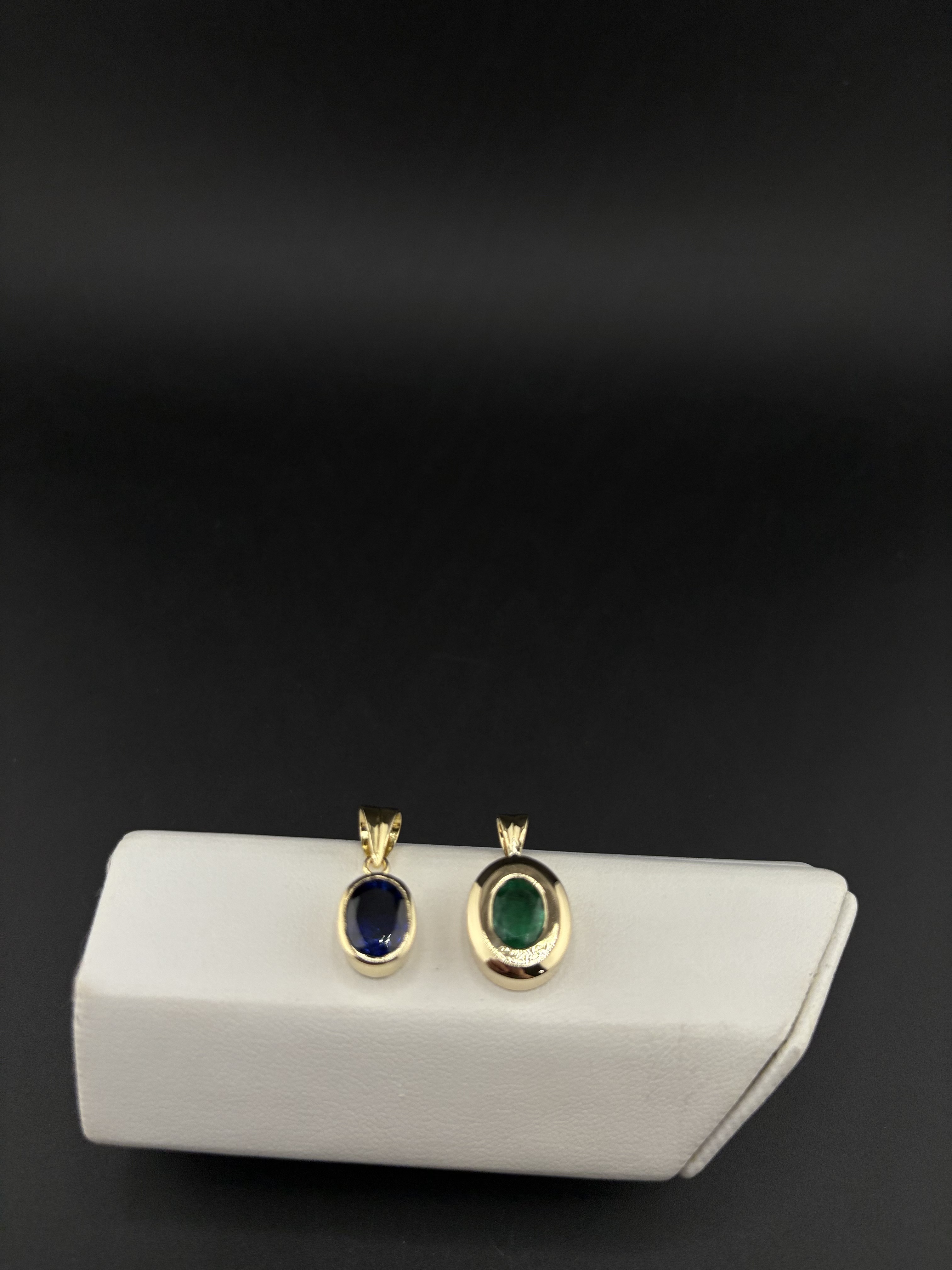 Sapphire and Emerald Gold Pendant Pair